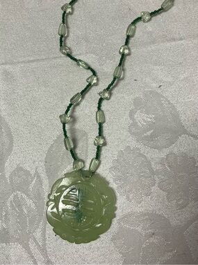 Translucent green jade like pendant necklace